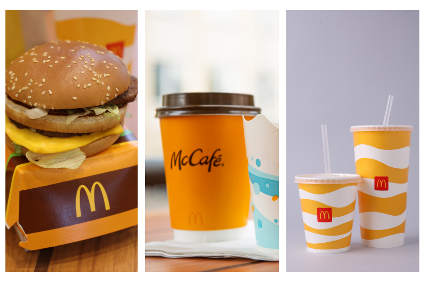  Imagem de produtos McDonald's com hambúrguer, café e bebidas em copos, destacando o branding da rede de fast-food McDonald's.