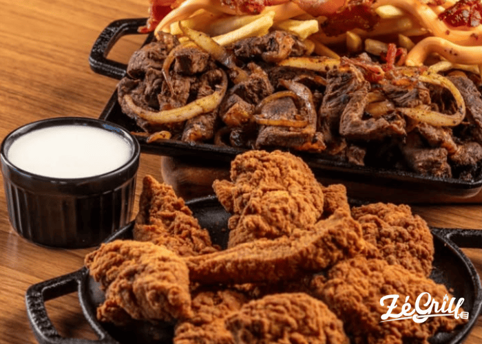 Porção de frango empanado do Zé Grill, cliente Saipos.